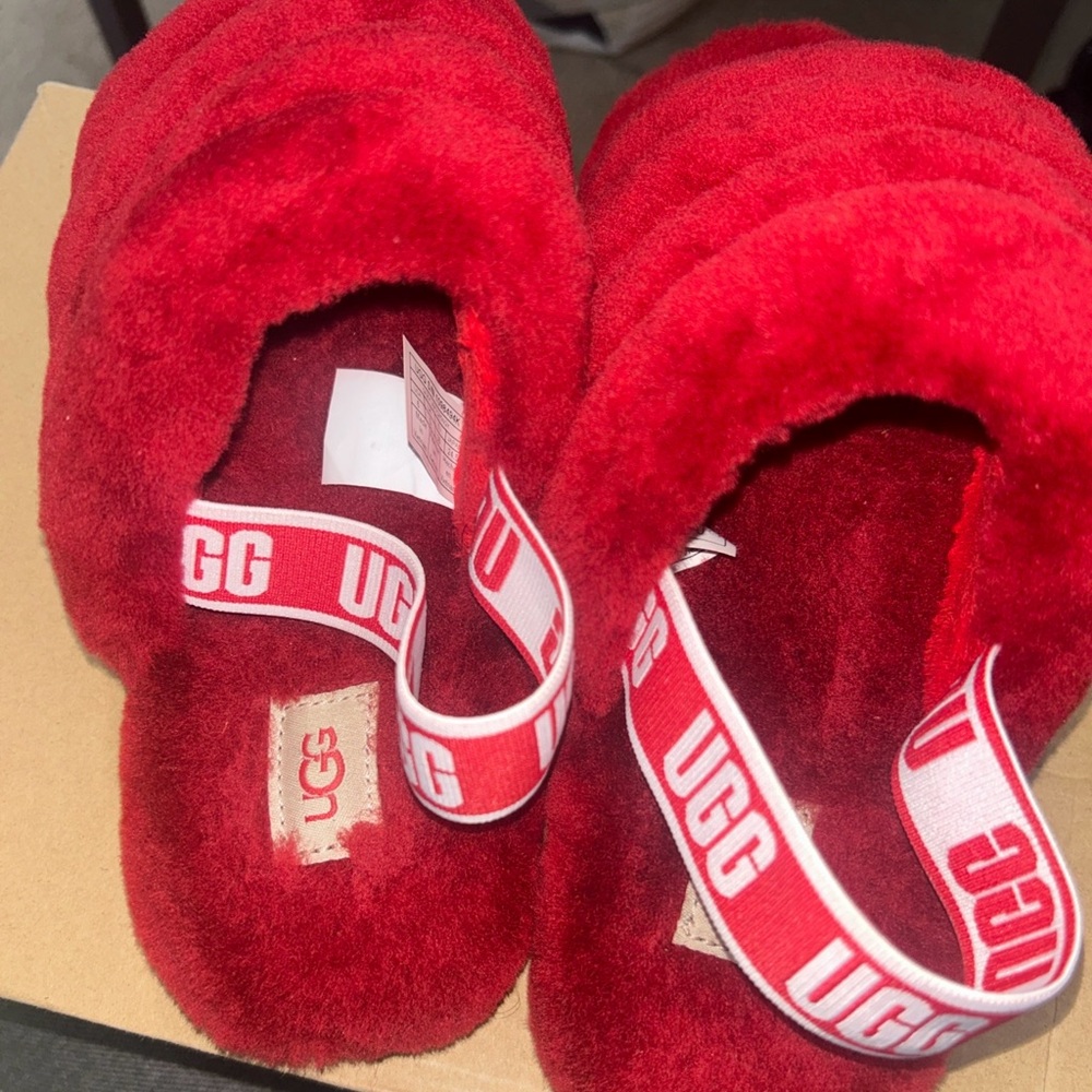New in Box UGG Red Fluffy Slippers size 6Y or women’s 8